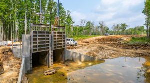 A view of the control structures under construction as part of the Laurel Ridge Levee Extension Project which will protect 8,500 structures within the Amite River floodplain from backwater flooding and high waters.