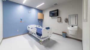 Atrium Health Cabarrus recently completed a renovation of its 3,700-square-foot behavioral health holding area, aiming to provide a safe and professional environment for individuals experiencing a mental health crisis. McKim & Creed played a pivotal role in this transformation by delivering comprehensive mechanical, electrical, plumbing, and fire protection (MEP/FP) engineering services. The upgraded facility now accommodates 8-10 Facility Guidelines Institute (FGI)-compliant behavioral health holding patient rooms, along with all necessary support spaces.