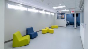 Atrium Health Cabarrus recently completed a renovation of its 3,700-square-foot behavioral health holding area, aiming to provide a safe and professional environment for individuals experiencing a mental health crisis. McKim & Creed played a pivotal role in this transformation by delivering comprehensive mechanical, electrical, plumbing, and fire protection (MEP/FP) engineering services. The upgraded facility now accommodates 8-10 Facility Guidelines Institute (FGI)-compliant behavioral health holding patient rooms, along with all necessary support spaces.