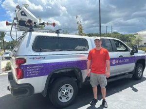 David Voorhees, LiDAR Tech with Mckim & Creed with the RIEGL VMX-2HA fitted to their vehicle.